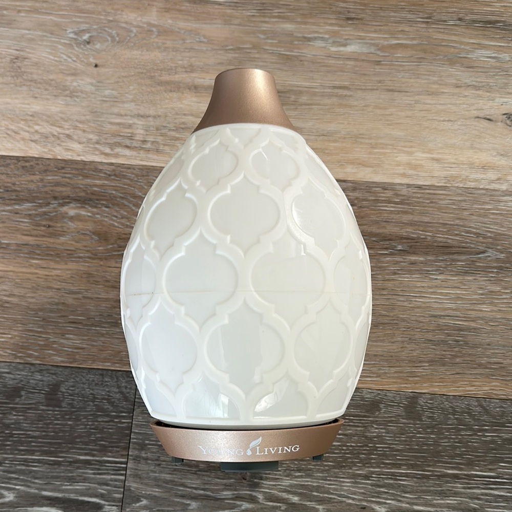 Young Living White and Gold Decorative Accent